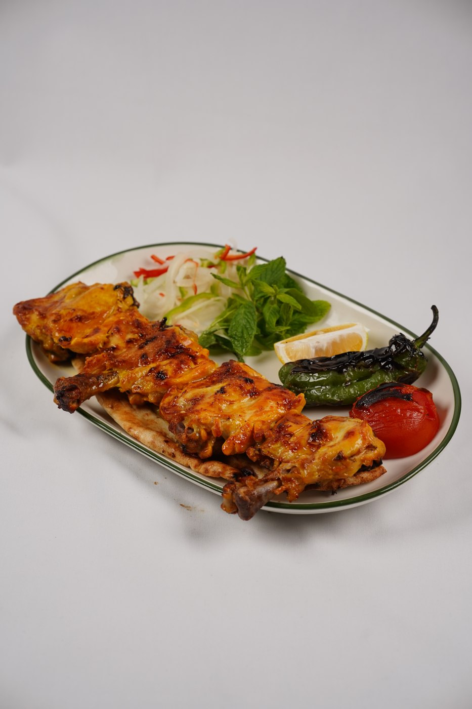 Bone-in chicken kebab